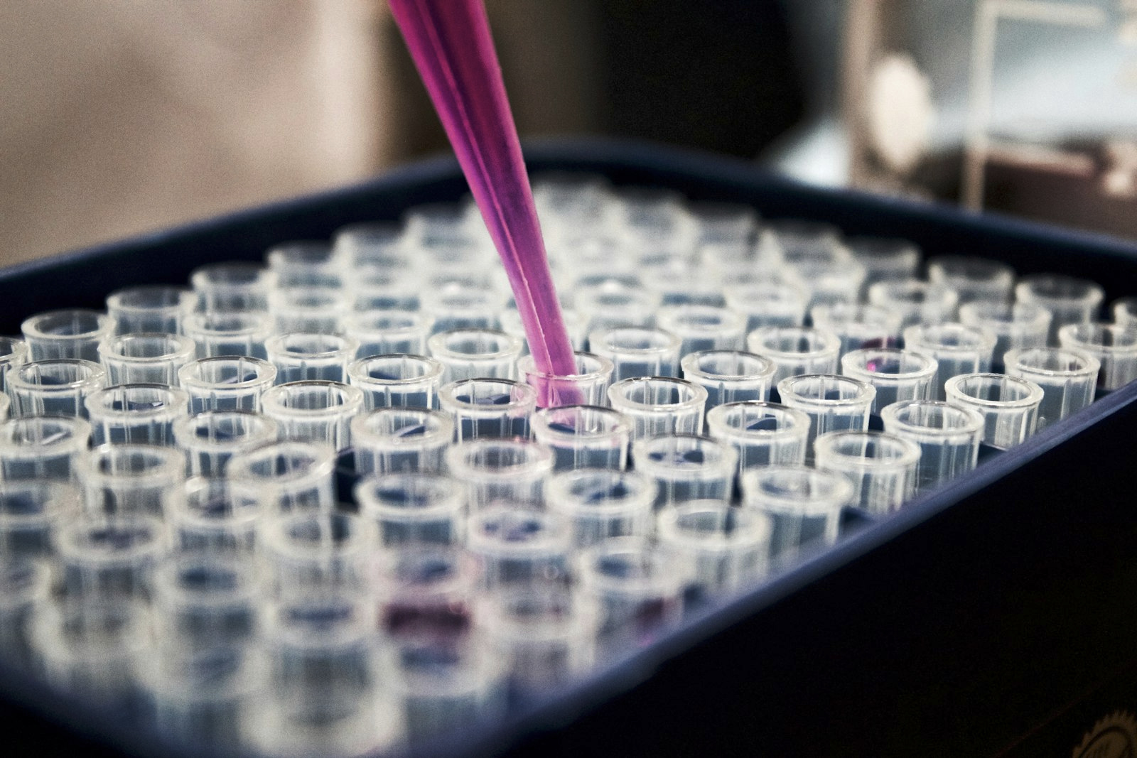 Pipetting samples in a research lab